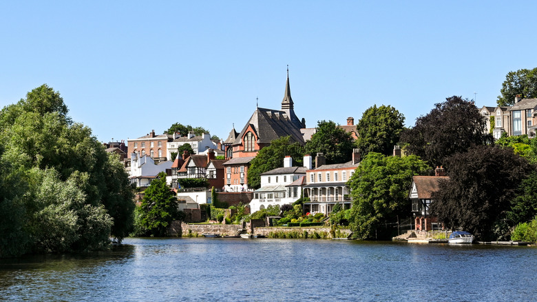 Historic buildings along a riverbank