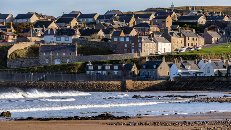 The coastal fishing village of Cullen, Scotland seen from a beach