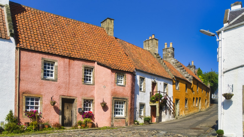 View of a colorful and cobblestoned street in Culross