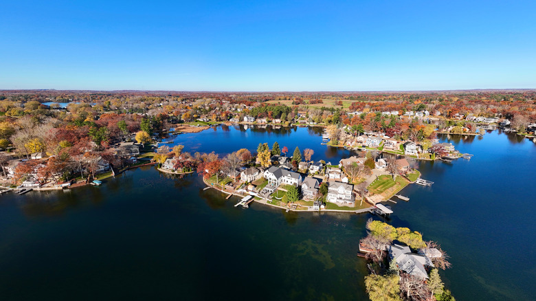 Houses and trees on a peninsula in Lake Orion, Michigan