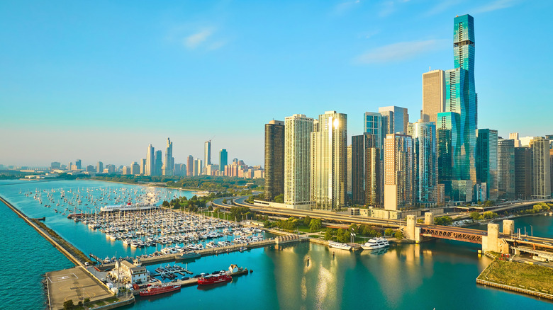 Boats docked at Navy Pier with the Chicago skyline in the background