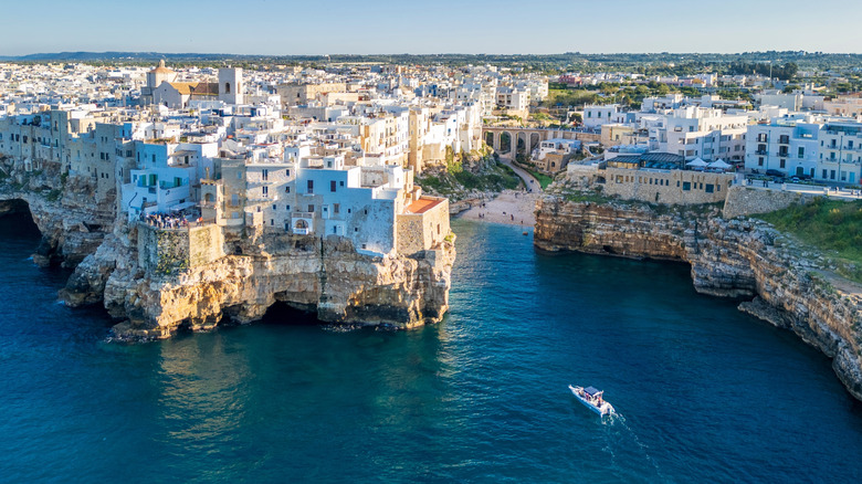 Polignano a Mare with clifftop white buildings in Italy