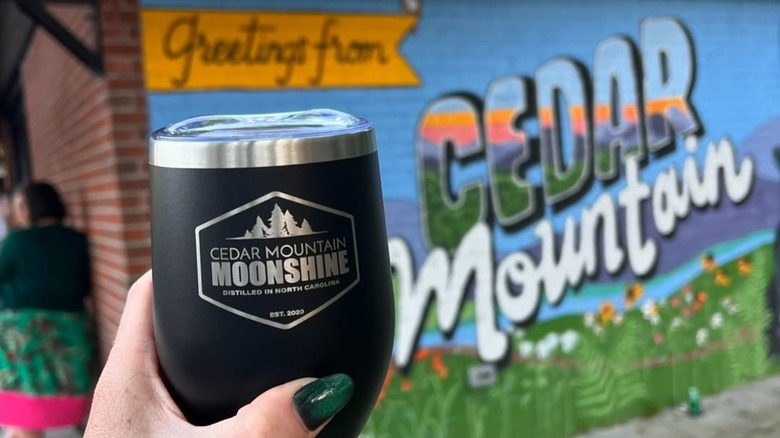 Cedar Mountain Moonshine bottle and Cedar Mountain mural