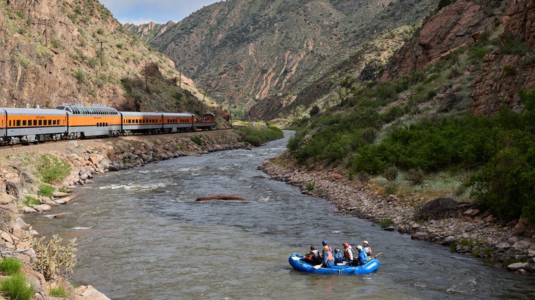 The Royal Gorge Railroad and rafters on the Arkansas River in Cañon City, Colorado