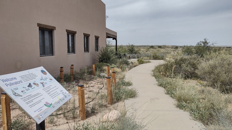 A nature trail winds through a pollinator garden outside the Sevilleta National Wildlife Refuge Visitor Center.