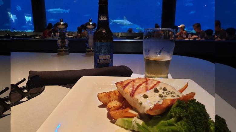Plate of salmon and broccoli at Sharks Under Grill and Bar