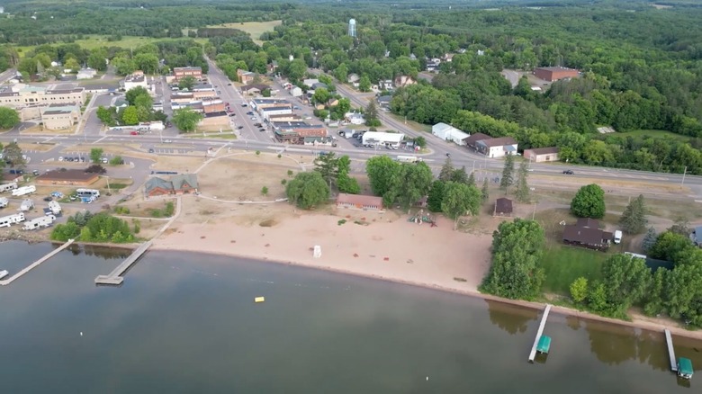 Aerial view of Shell Lake Beach with part of the downtown area behind it