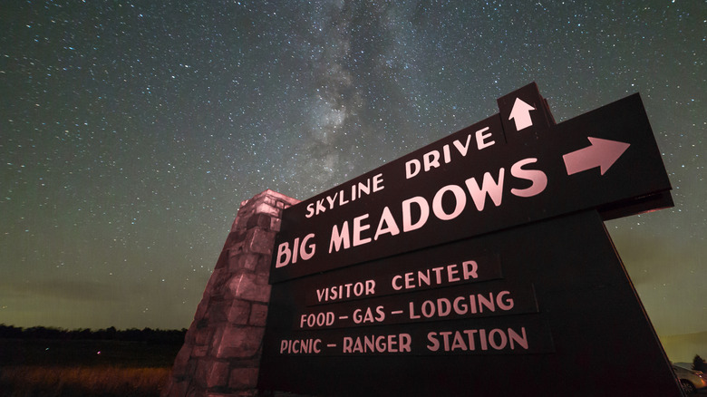 The Milky Way above a sign pointing the way to Skyline Drive and Big Meadows in Shenandoah National Park