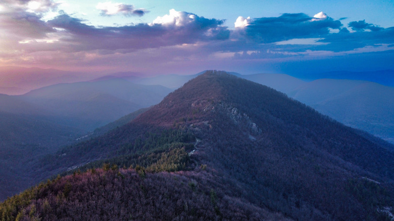 Aerial view of Hawksbill Mountain, the highest peak in Shenandoah National Park, Virginia, USA, showcasing its rugged terrain and surrounding Blue Ridge Mountains