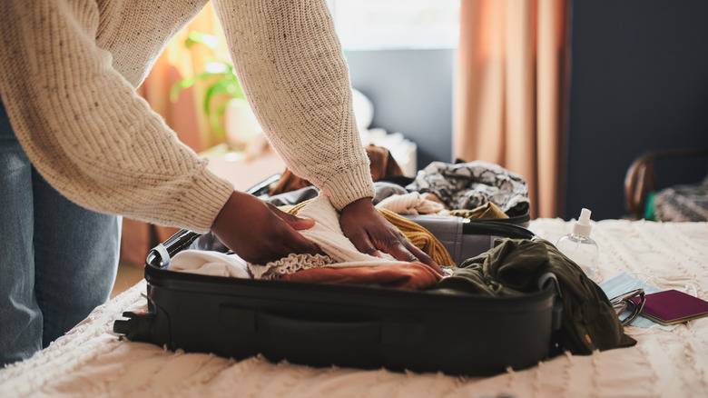packing up suitcase