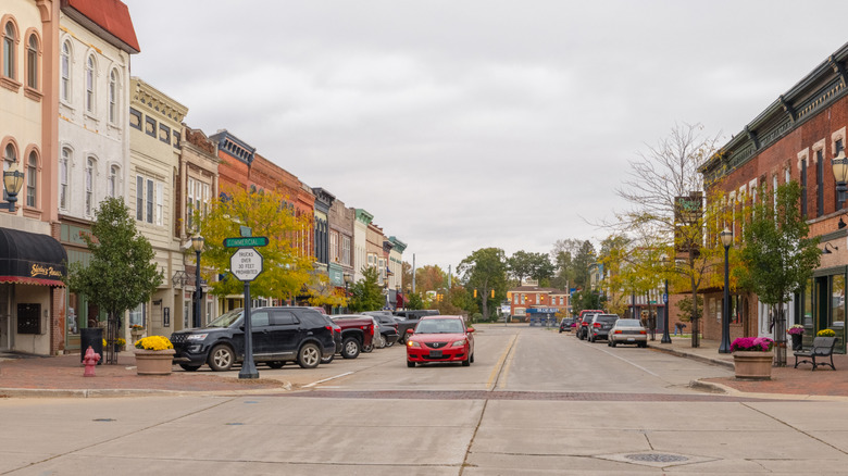 A main street in Dowagiac, Michigan, lined with buildings and parked cars
