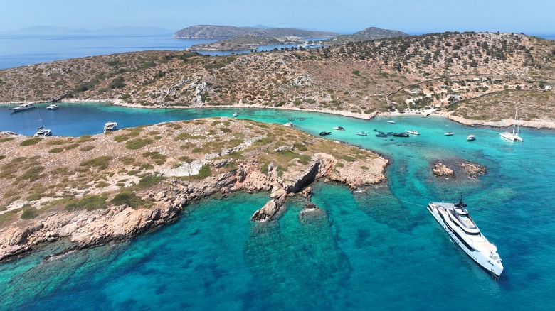Aerial drone photo of paradise blue lagoon and sandy beaches of Tiganakia bay forming a complex of small islets in island of Arkoi or Arki, Dodecanese, Greece