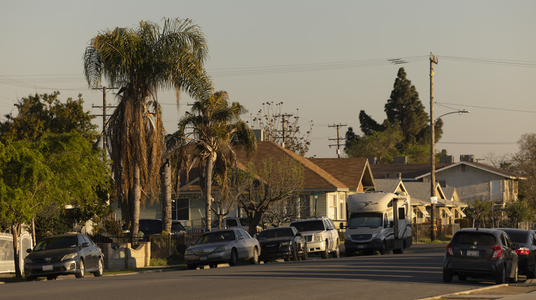 Late afternoon traffic passes through downtown Delano, California