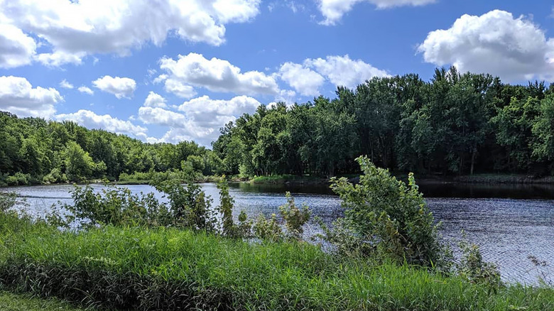 Cloudy blue sky over the river in Greenwood, Wisconsin