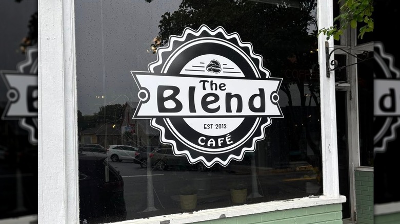 Exterior of The Blend Cafe, with the logo on the window