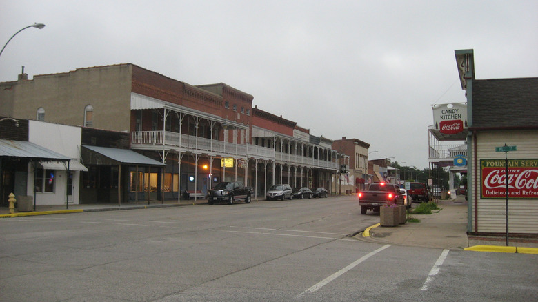 A view of historic buildings with two-story porches in Greenup, Illinois