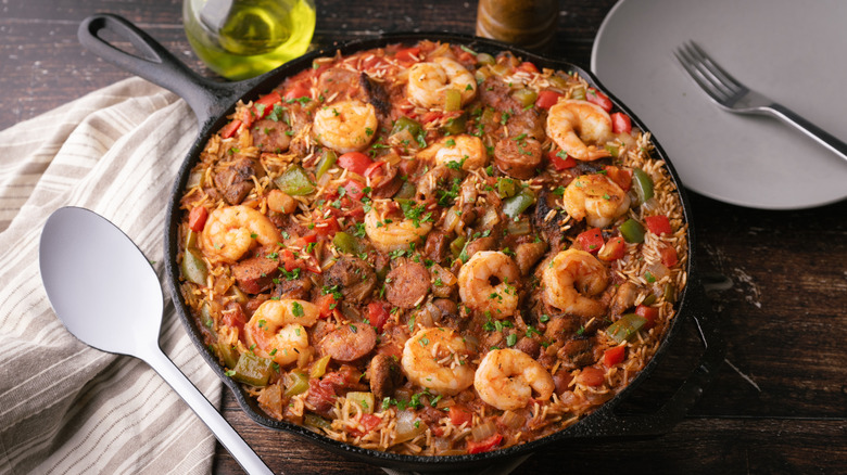 A bowl of jambalaya with shrimp, sausage, and rice