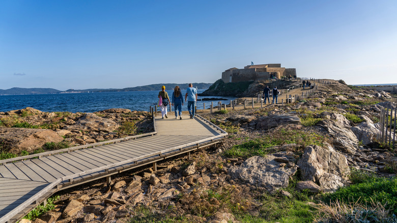 A pathway across the rocky landscape next to the sea in Hyères.