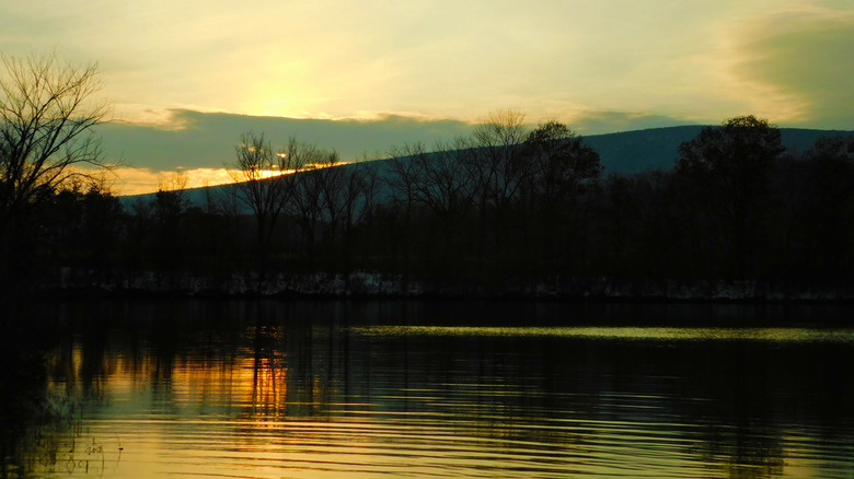 Sunset reflected off a lake surface in Marklesburg