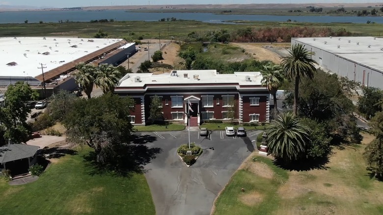 Aerial view of the Antioch Historical Museum with a river in the background