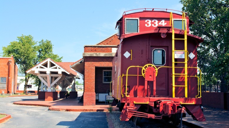 Red caboose at Historical Museum & Train Depot in Bristow, Oklahoma