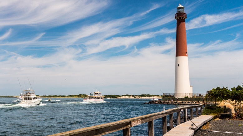 Fishing boats leaving the inlet near Barnegat Bay Lighthouse