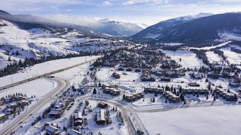 Aerial view of the town of Keystone, Colorado covered in snow