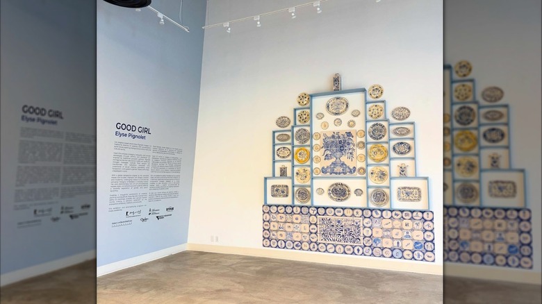 Ceramic art pieces against a white wall at Ogden Contemporary Arts