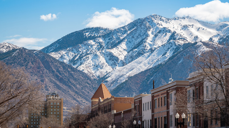 Buildings in Ogden with snowy mountain in background