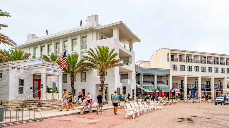Square in Seaside, Florida with quaint post office and shops.