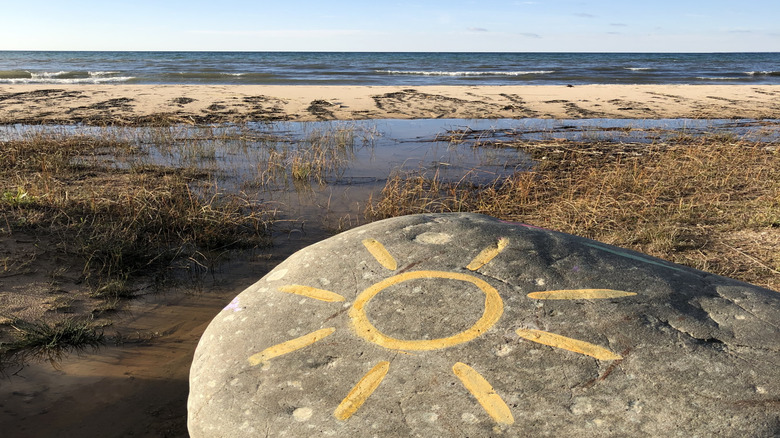 A view of the sand and water from Cross Village Beach