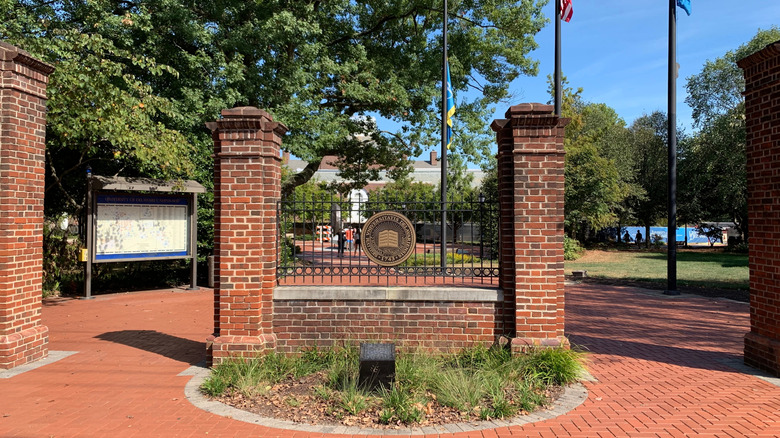Brick columns welcome students and visitors to the University of Delaware