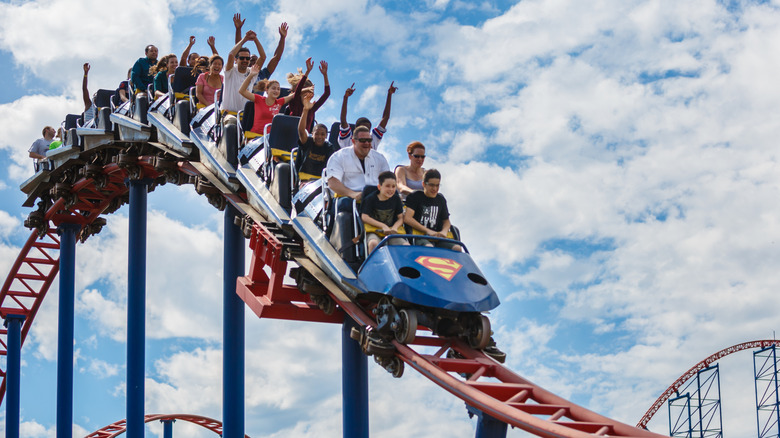 People on a Superman rollercoaster