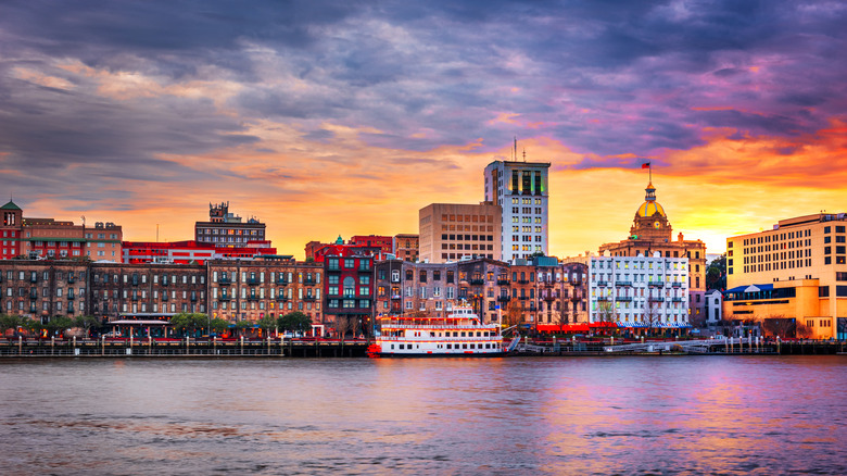 Savannah skyline over river at sunset