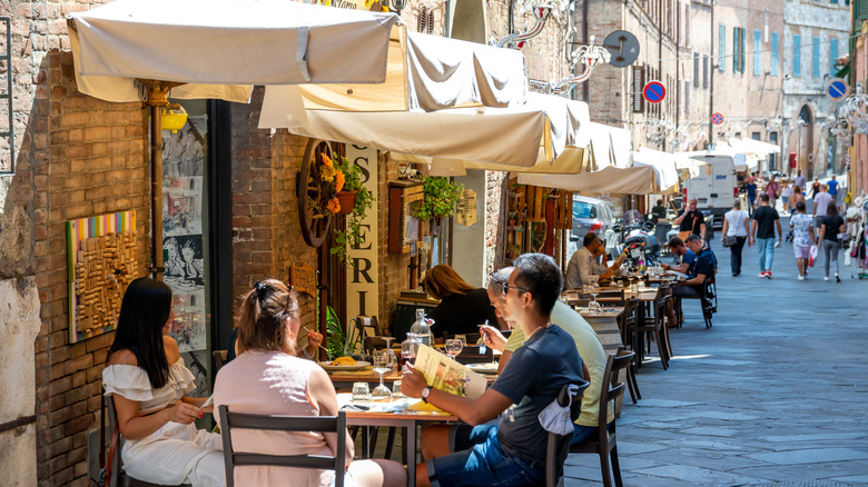 People sitting in outdoor Italian restaurants