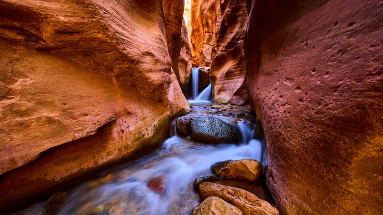 Waterfall between slot canyon in Kanarra Falls