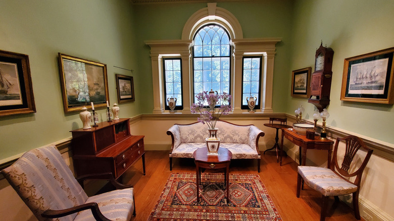 Living room of antique house with furniture and paintings at the Winterthur Museum