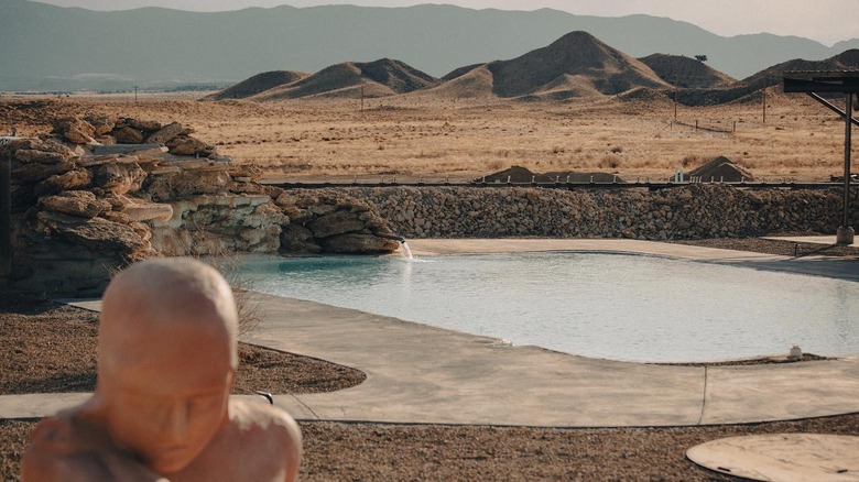 Desert Reef Hot Springs pool surrounded by Colorado's desert landscape