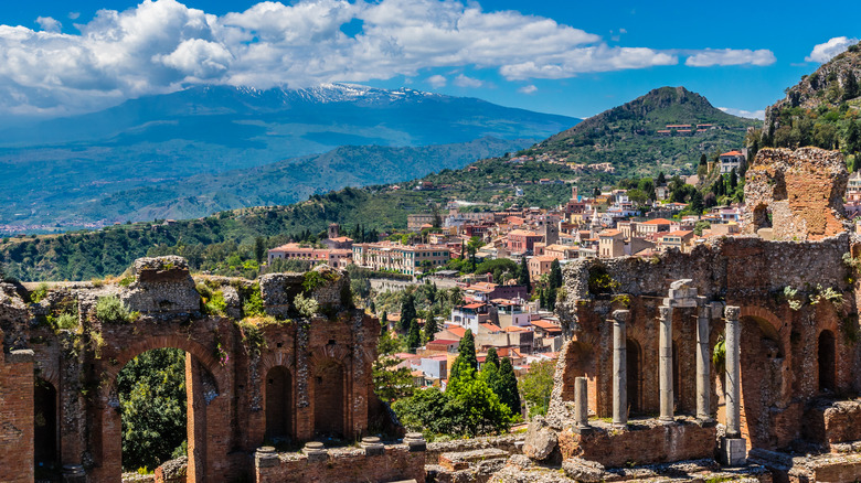 Taormina's Greek-Roman theater with Mount Etna in distance