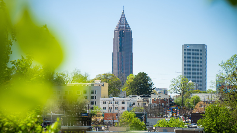 View through trees of SoNo at Bank of America plaza in Atlanta