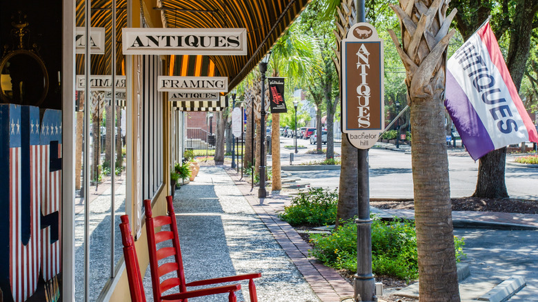 A store in Walterboro, South Carolina with four signs saying "antiques"