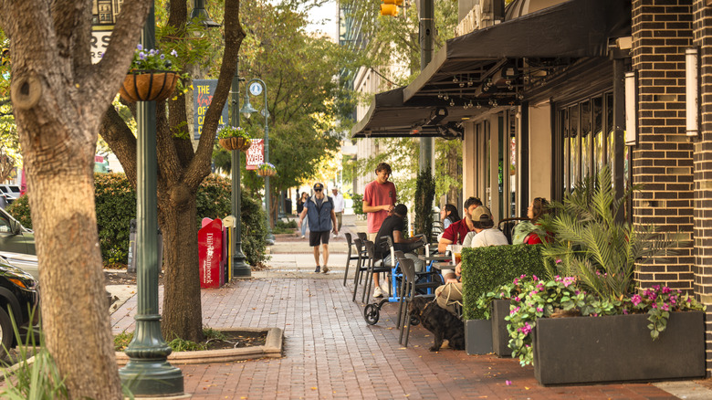 People eating outside on Main Street in Columbia