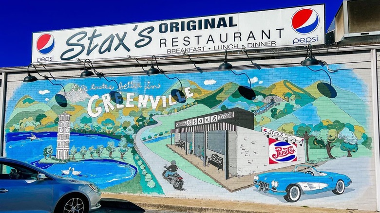 The facade of Stax's Original Restaurant with a Greenville mural