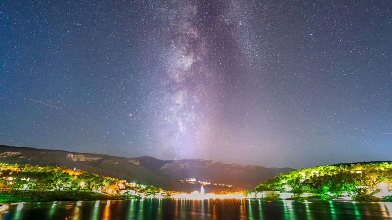 Milky way, stars on hvar island over city Jelsa in croatia. Clear night sky