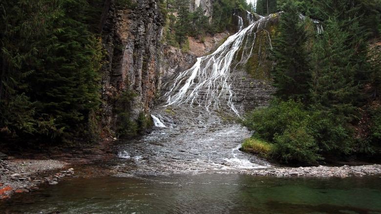 Waterfall cascading over terraced rocks
