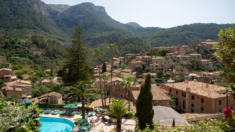 View of the Deià's historic town surrounded by lush mountains