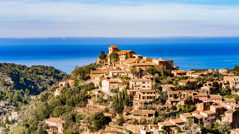 A bird's eye view of Deià, Mallorca, overlooking the sea