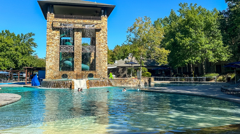 One of Woodlands Resort's Forest Oasis Waterpark and Lazy River's pools with the lazy river in the background