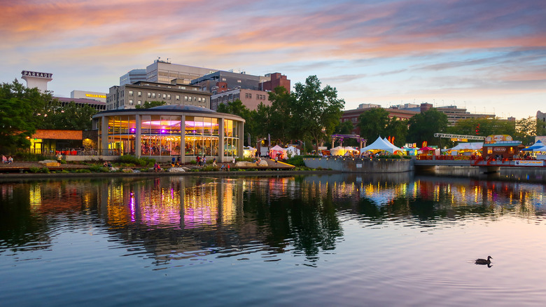The Looff Carousel overlooking the water in Riverfront Park at sunset in Spokane, Washington