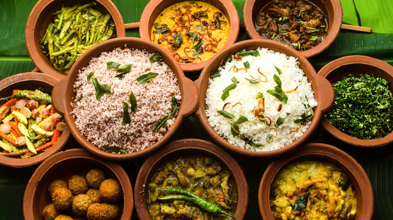 A banana leaf covered in traditional Sri Lankan curry and rice